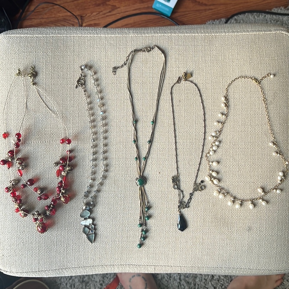 Selection of necklaces of various metals and gemstones